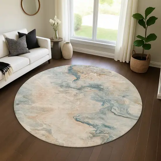 8' Teal Peach And Ivory Abstract Washable Round Rug With UV Protection Photo 4