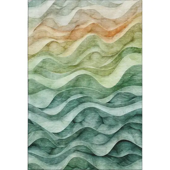 8' Teal Peach And Lime Green Abstract Washable Area Rug With UV Protection Photo 1