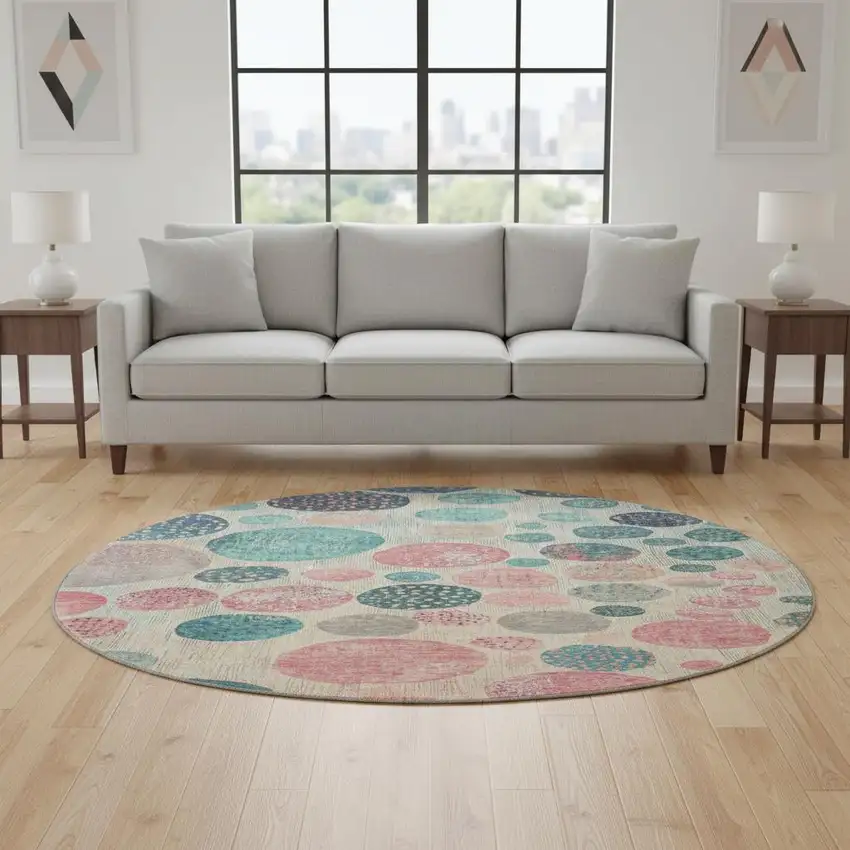 8' Teal Pink And Beige Geometric Washable Round Rug With UV Protection Photo 2