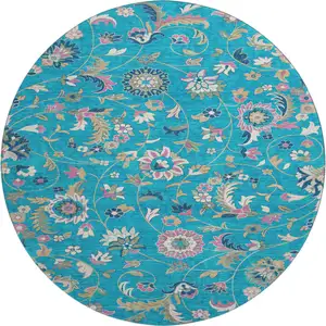 Photo of 8' Teal Pink And Copper Floral Washable Round Rug With UV Protection