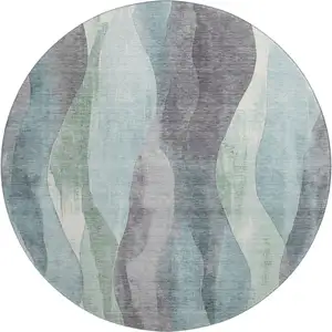 Photo of 8' Teal Plum And Ivory Abstract Washable Round Rug With UV Protection