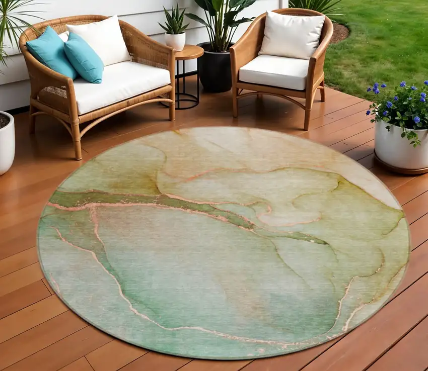 8' Teal Round Abstract Washable Non Skid Area Rug With UV Protection Photo 1