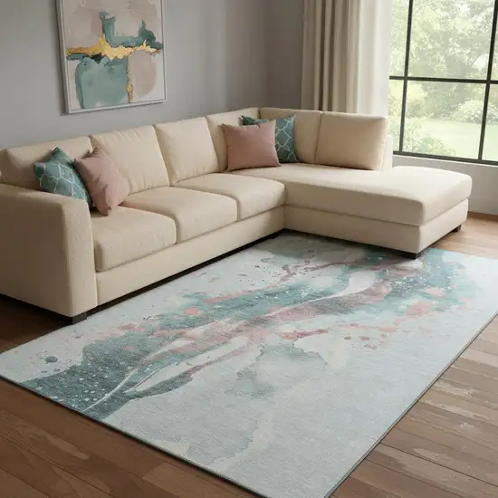 8' Teal Salmon And Ivory Abstract Washable Area Rug With UV Protection Photo 2