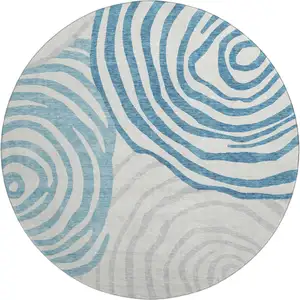 Photo of 8' Teal Silver And Gray Abstract Washable Round Rug With UV Protection