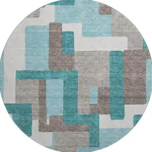 Photo of 8' Teal Taupe And Beige Abstract Geometric Washable Round Rug With UV Protection