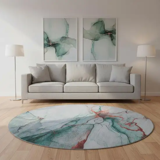 8' Teal Terra Cotta And Ivory Abstract Washable Round Rug With UV Protection Photo 2