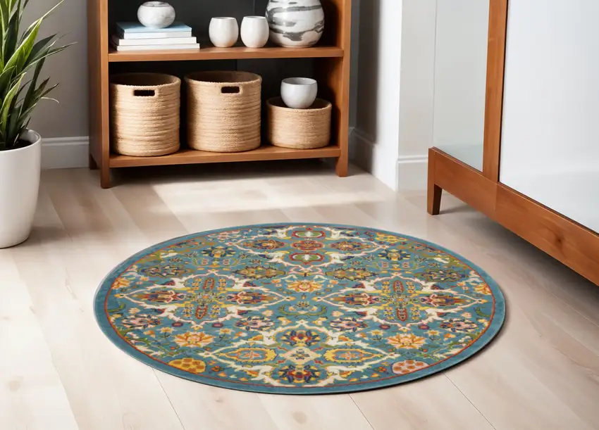 5' Teal and Ivory Round Floral Power Loom Area Rug Photo 1