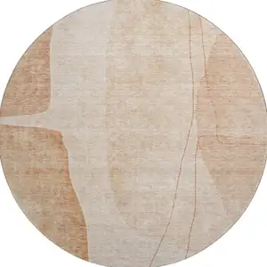 Photo of 8' Terra Cotta And Beige Abstract Washable Round Rug With UV Protection