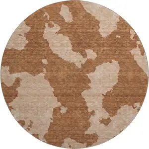 Photo of 8' Terra Cotta And Beige Abstract Washable Round Rug With UV Protection