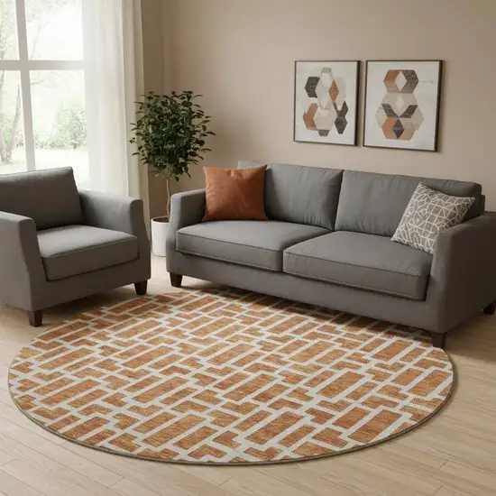 8' Terra Cotta And Beige Geometric Washable Round Rug With UV Protection Photo 1