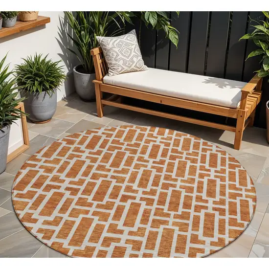 8' Terra Cotta And Beige Round Geometric Washable Indoor Outdoor Area Rug Photo 1