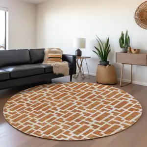Photo of 8' Terra Cotta And Beige Round Geometric Washable Indoor Outdoor Area Rug