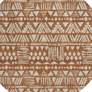 Photo of 8' Terra Cotta And Beige Round Southwestern Washable Indoor Outdoor Area Rug