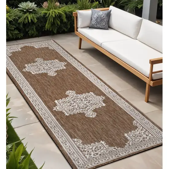 8' Terra Cotta And Cream Medallion Indoor Outdoor Runner Rug Photo 1