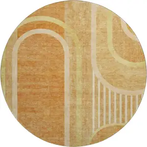 Photo of 8' Terra Cotta And Gold Geometric Washable Round Rug With UV Protection