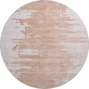 Photo of 8' Terra Cotta And Ivory Abstract Washable Round Rug With UV Protection