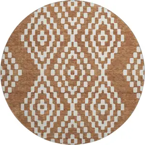 Photo of 8' Terra Cotta And Ivory Geometric Washable Round Rug With UV Protection