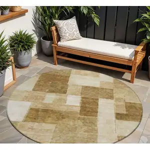Photo of 8' Terra Cotta Beige And Brown Round Geometric Washable Indoor Outdoor Area Rug
