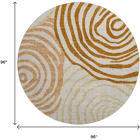 8' Terra Cotta Beige And Gold Abstract Washable Round Rug With UV Protection Photo 3