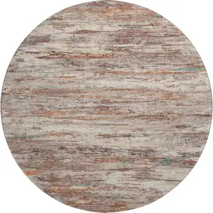 Photo of 8' Terra Cotta Beige And Teal Abstract Washable Round Rug With UV Protection