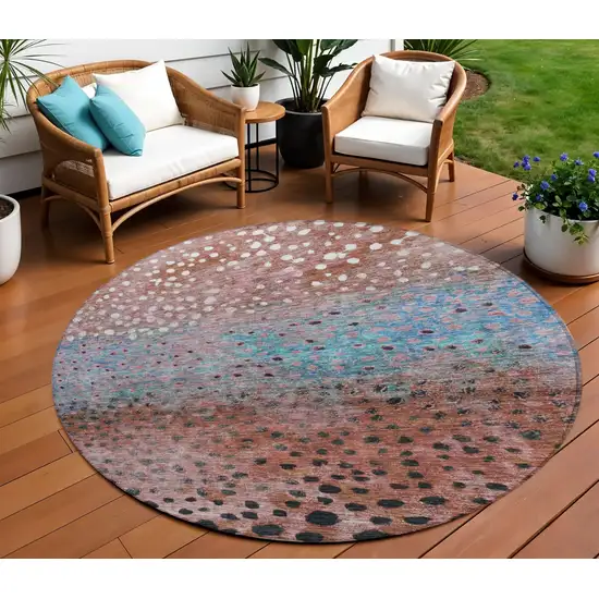 8' Terra Cotta Blue And Black Round Abstract Washable Indoor Outdoor Area Rug Photo 1