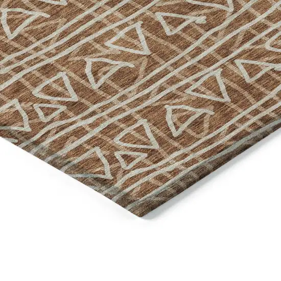 8' Terra Cotta Copper And Beige Round Geometric Washable Indoor Outdoor Area Rug Photo 3