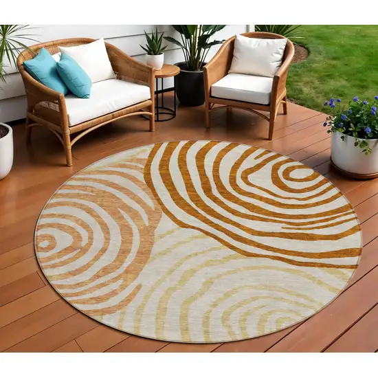 8' Terra Cotta Copper And Gold Round Abstract Washable Indoor Outdoor Area Rug Photo 1