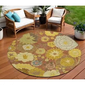 Photo of 8' Terra Cotta Gold And Beige Round Floral Washable Indoor Outdoor Area Rug