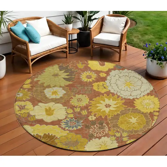 8' Terra Cotta Gold And Beige Round Floral Washable Indoor Outdoor Area Rug Photo 1