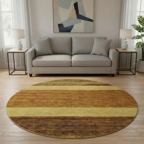 8' Terra Cotta Gold And Brown Striped Washable Round Rug With UV Protection Photo 2