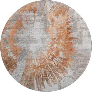 Photo of 8' Terra Cotta Ivory And Gray Abstract Washable Round Rug With UV Protection
