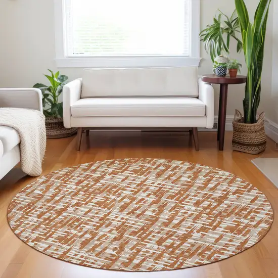 8' Terra Cotta Tan And Ivory Round Abstract Washable Indoor Outdoor Area Rug Photo 9