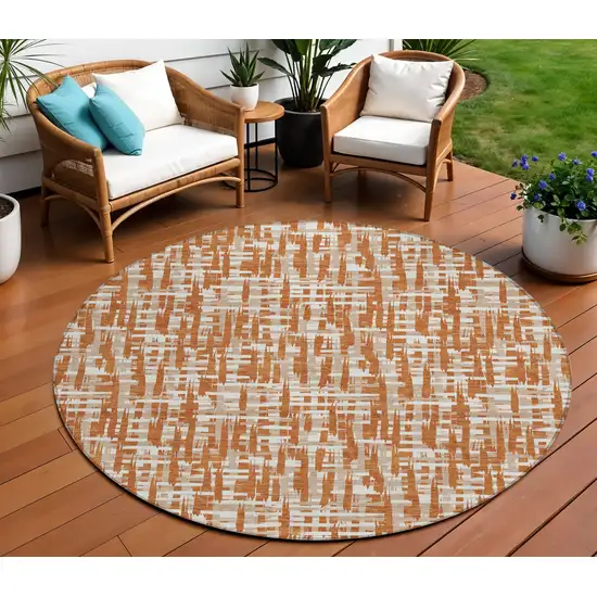 8' Terra Cotta Tan And Ivory Round Abstract Washable Indoor Outdoor Area Rug Photo 1