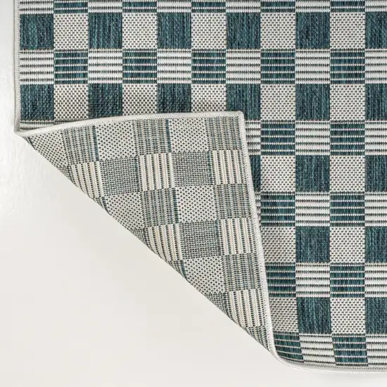 8' Turquoise And Cream Geometric Indoor Outdoor Runner Rug Photo 4