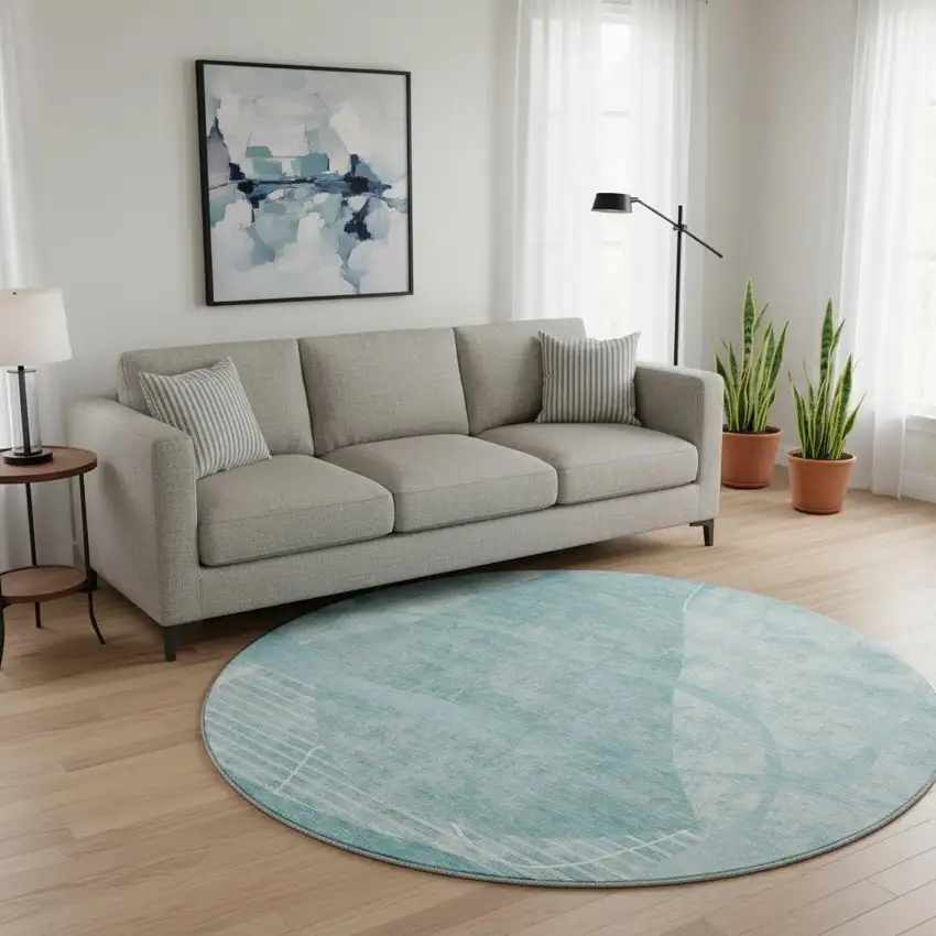 8' Turquoise And Ivory Abstract Geometric Washable Round Rug With UV Protection Photo 2