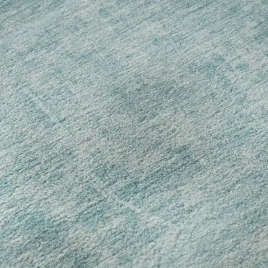 8' Turquoise And Ivory Abstract Geometric Washable Round Rug With UV Protection Photo 9