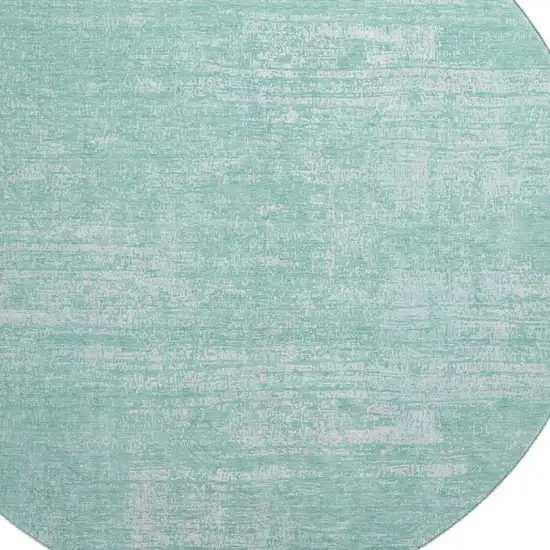 8' Turquoise And Ivory Abstract Washable Round Rug With UV Protection Photo 3