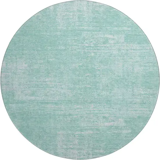 8' Turquoise And Ivory Abstract Washable Round Rug With UV Protection Photo 1