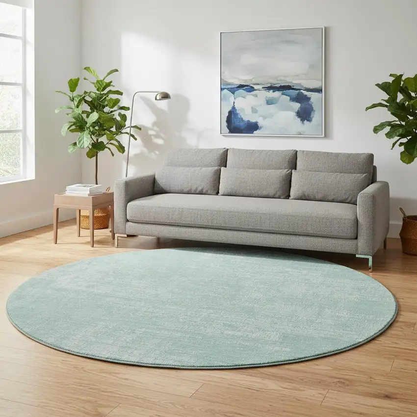 8' Turquoise And Ivory Abstract Washable Round Rug With UV Protection Photo 2