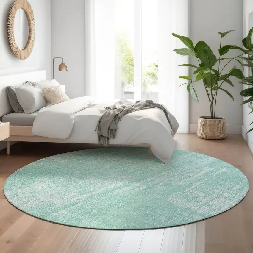 8' Turquoise And Ivory Abstract Washable Round Rug With UV Protection Photo 5