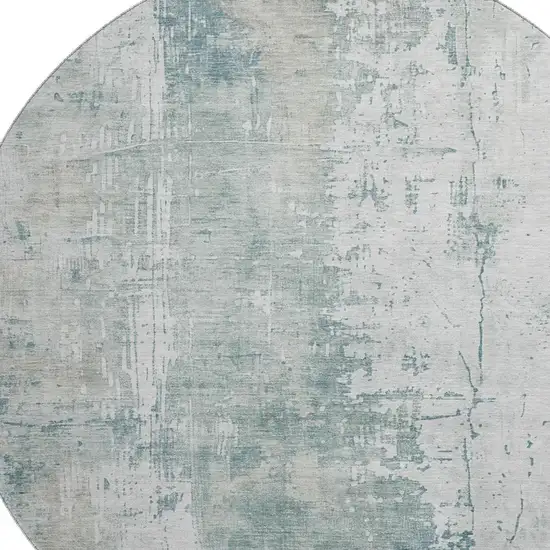 8' Turquoise And Ivory Abstract Washable Round Rug With UV Protection Photo 2