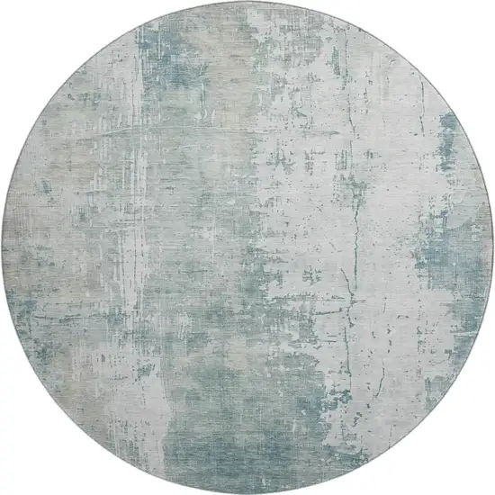 8' Turquoise And Ivory Abstract Washable Round Rug With UV Protection Photo 1