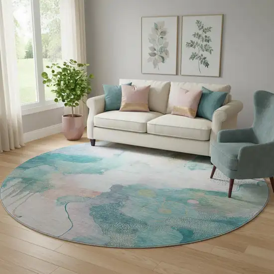 8' Turquoise And Ivory Abstract Washable Round Rug With UV Protection Photo 2