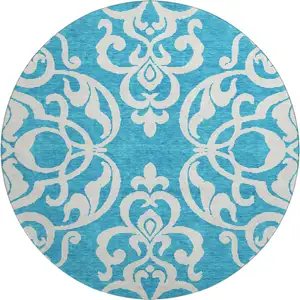 Photo of 8' Turquoise And Ivory Damask Washable Round Rug With UV Protection