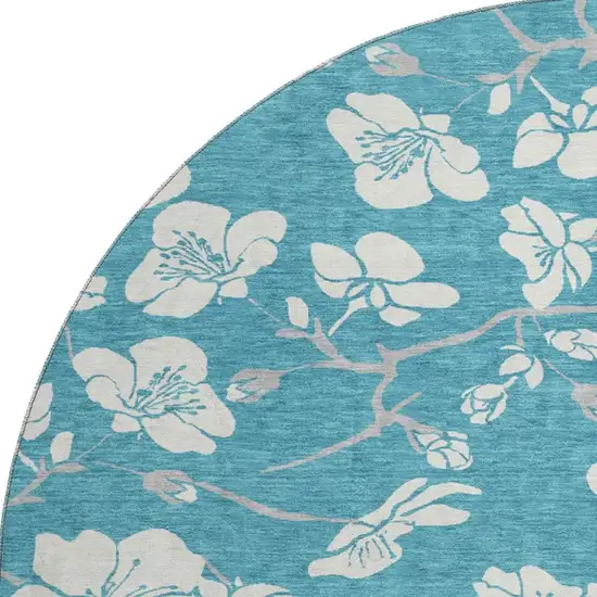 8' Turquoise And Ivory Floral Washable Round Rug With UV Protection Photo 3