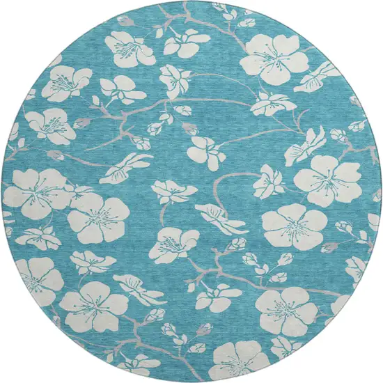 8' Turquoise And Ivory Floral Washable Round Rug With UV Protection Photo 1