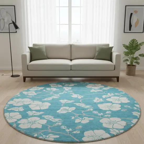 8' Turquoise And Ivory Floral Washable Round Rug With UV Protection Photo 2