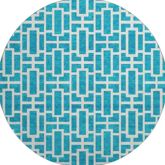 8' Turquoise And Ivory Geometric Washable Round Rug With UV Protection Photo 4