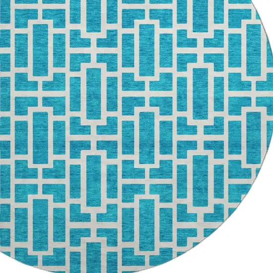 8' Turquoise And Ivory Geometric Washable Round Rug With UV Protection Photo 3