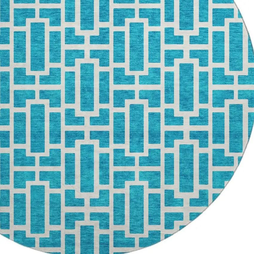 8' Turquoise And Ivory Geometric Washable Round Rug With UV Protection Photo 3